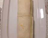 Foto del paso 3 de la receta: Arrollado de pan molde relleno de salmón ahumado y palmitos