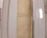 Foto del paso 3 de la receta: Arrollado de pan molde relleno de salmón ahumado y palmitos