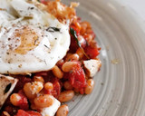 Foto del paso 7 de la receta: Fessolets con tomate y queso feta al horno con huevo frito