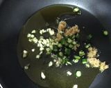 A picture of step 2 of Fried rice-a chinese dish served with manchurian.