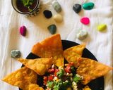 A picture of step 4 of Veg Nachos with cheesy Dip.