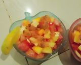 A picture of step 2 of Fruits salad with dry grapes.