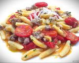 Foto del passaggio 6 della ricetta Malloreddus con ragù di tastasale