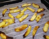 A picture of step 3 of Home made oven chips!!!.