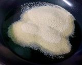 A picture of step 1 of Milk Rava Kesari.