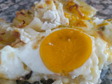 Papas con queso y huevo al horno