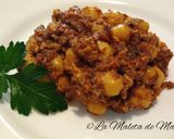 Foto del paso 5 de la receta Huevos revueltos con morcilla de cebolla con piñones y garbanzos