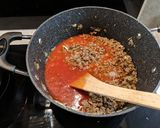 A picture of step 6 of Greek lamb pastitsio bake with rocket salad.