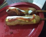 Foto del paso 5 de la receta: Banderillas con harina de hot cakes