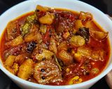 A picture of step 4 of Pineapple- tomato Khatta meetha.