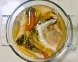 A picture of step 9 of Salmon & Kang Kong in Tamarind Broth : Filipino Fish Sinigang > Savoury Sour Soup vs Tom Yum.