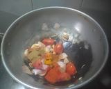 A picture of step 2 of Chana Masala.