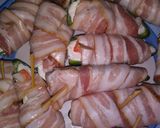 A picture of step 3 of Texas Crabb an Cream Cheese jalapenos wrapped in Bacon.