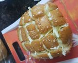 A picture of step 4 of Pull over garlic bread.