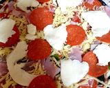 A picture of step 5 of My Over Loaded Pizza 😘.
