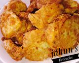 A picture of step 3 of Sweet potatoes coated with egg.