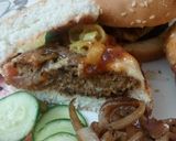 A picture of step 1 of Beef steak style burgers serve with Apple Mac salad and fries.