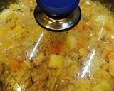A picture of step 8 of Coconut Chicken Curry.