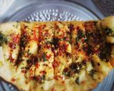 A picture of step 8 of Stuffed garlic bread.