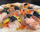 Foto del paso 3 de la receta: Carpacho de tomate rosa y bacalao ahumado