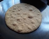 A picture of step 12 of Pita Bread Chick Pea Kidney bean filling with Tzatziki sauce.