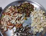 A picture of step 1 of Paneer kalakand with Koya dry fruits kesar dessert.