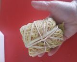 Foto del passaggio 7 della ricetta Involtini di verza ripiena di mamma Jò
