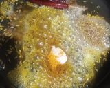 A picture of step 8 of Karonda pickle.