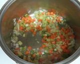 A picture of step 3 of Jamerican Curry Chicken & Rice Soup.