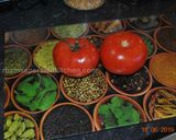 A picture of step 1 of Deep Fried Tomato گوجه فرنگی سرخ شده.