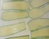 Foto del paso 7 de la receta: Calabacitas rellenas de atún a la mexicana