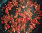 Foto del paso 6 de la receta: Arroz negro con calamar