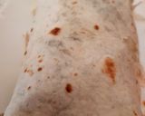 A picture of step 5 of My Marinated Chicken Strips in a wrap Red Hot Sauce.