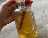 A picture of step 3 of Rakomelo | raki with honey | Greek traditional drink.