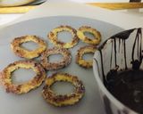 A picture of step 4 of Baked churros with chocolate sauce.