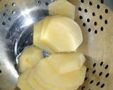 A picture of step 3 of Spicy Potato Slices.