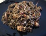 Foto del paso 8 de la receta Arroz negro a la paella con calamares de potera, gambones y alioli de dos ajos
