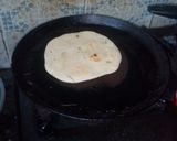 A picture of step 18 of Kulcha and bhuna chicken masala.