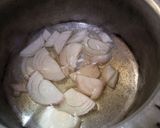A picture of step 1 of Aloo gosht ka salan.