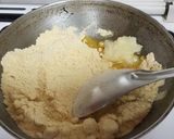 A picture of step 2 of Besan laddo with gud powder.