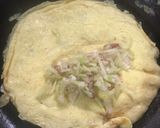 A picture of step 4 of Egg Roll.