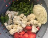 A picture of step 1 of Instant Vegetable Noodle soup.