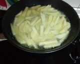 Foto del paso 1 de la receta: Patatas fritas con queso y pavo al horno