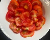 A picture of step 1 of White Wine Vinegar on Tomato Salad.