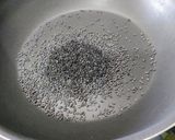 A picture of step 2 of Kavuni Arisi (Black rice) Ladoo.