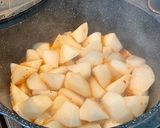 A picture of step 8 of Daikon Radish with Shiitake Mushrooms and Snow Peas.
