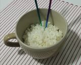 Foto del paso 1 de la receta Chipirones en su tinta con arroz blanco