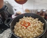 A picture of step 3 of Stovetop masala Popcorn.