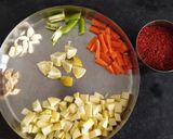 A picture of step 1 of Raw Mango mixed Pickle.