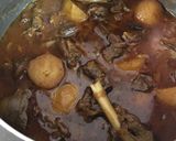 A picture of step 4 of Kesari Rice with chicken fry and mutton kosha.